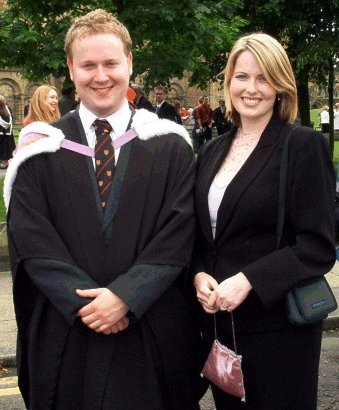 Beth with her brother, John, at his graduation, July 3rd 2003.
